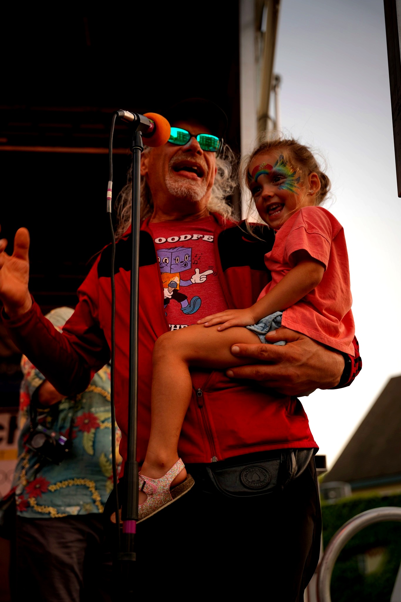 Rökker announcing from the stage at AtwoodFest